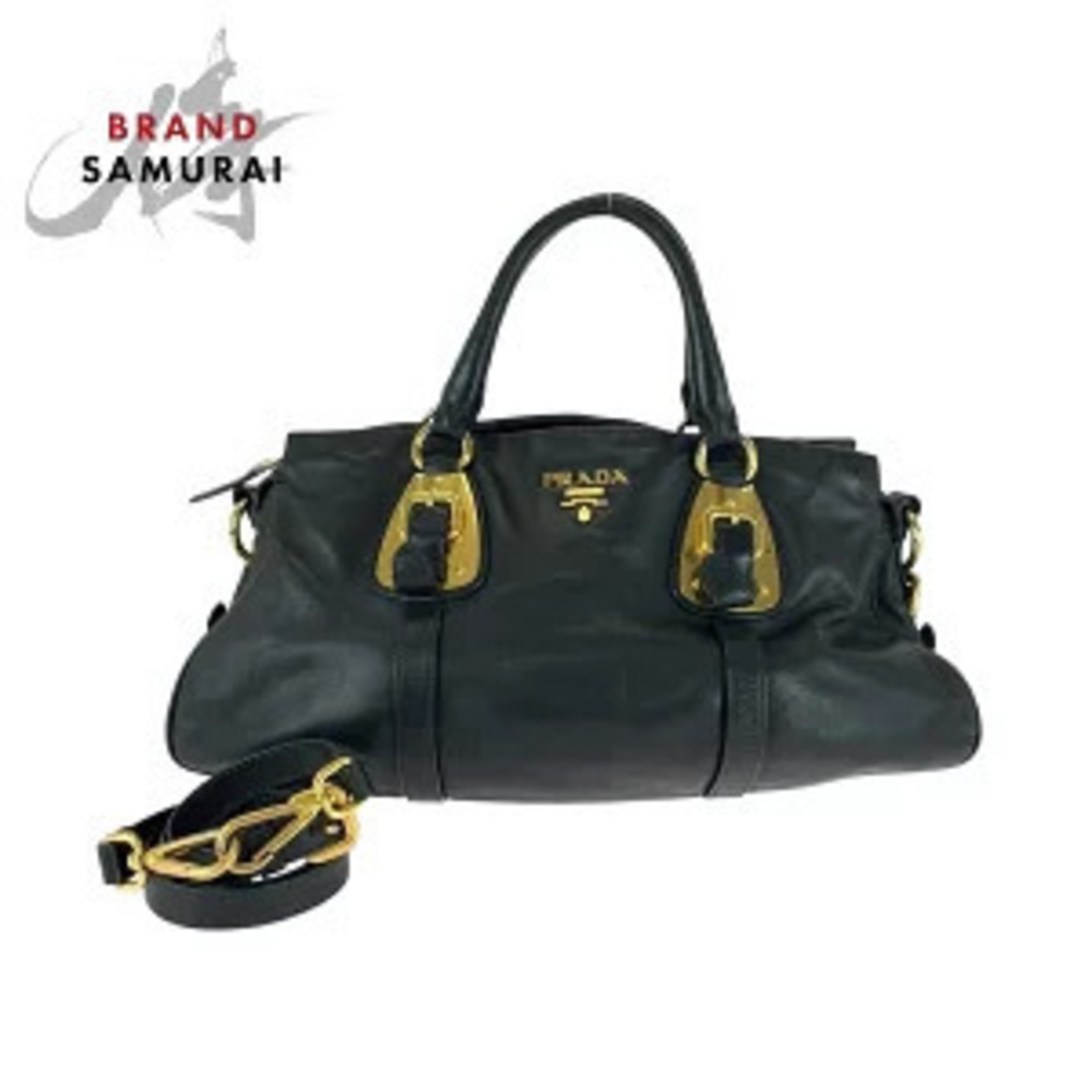 Prada Soft Calf Leather handbag buckle on the front Black